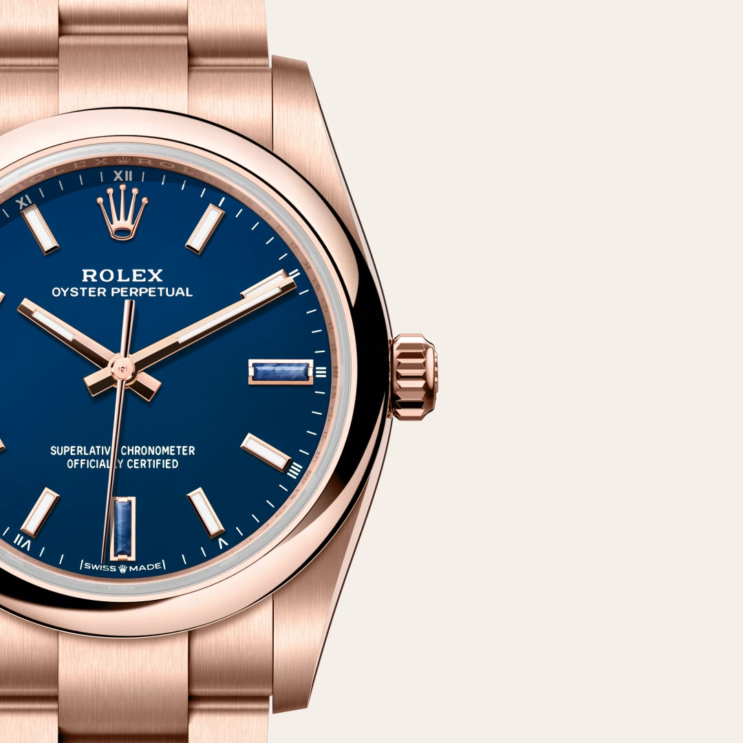 m124205-0002-slide3 | Brela Rose gold Rolex Oyster Perpetual watch with a blue dial, rose-gold hands and hour markers | Brela