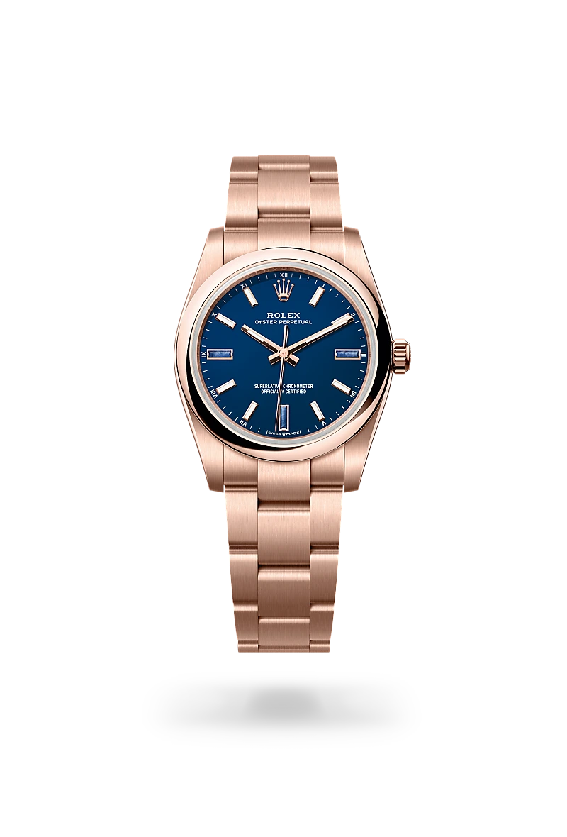 m124205-0002-upright-landscape | Brela Rose gold Rolex Oyster Perpetual wristwatch with a blue dial and brushed metal bracelet. | Brela