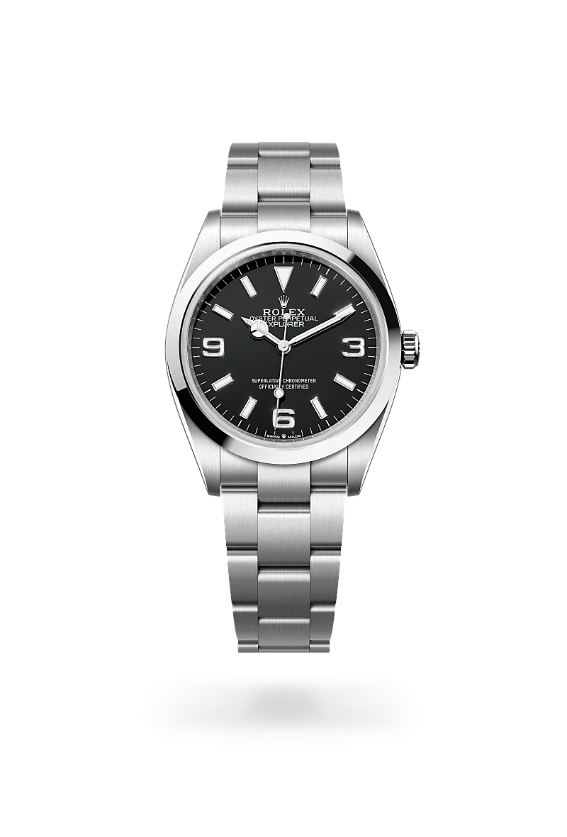 m124270-0001-upright-landscape | Brela Stainless steel Rolex Explorer wristwatch with a black dial and silver indices on a matching metal bracelet outside a black background. | Brela