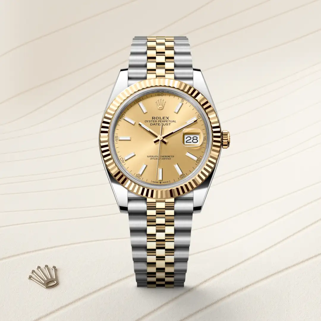 Two-tone Rolex Datejust wristwatch with gold bezel and Jubilee bracelet, champagne dial, date window at 3 o'clock showing 28. | Brela