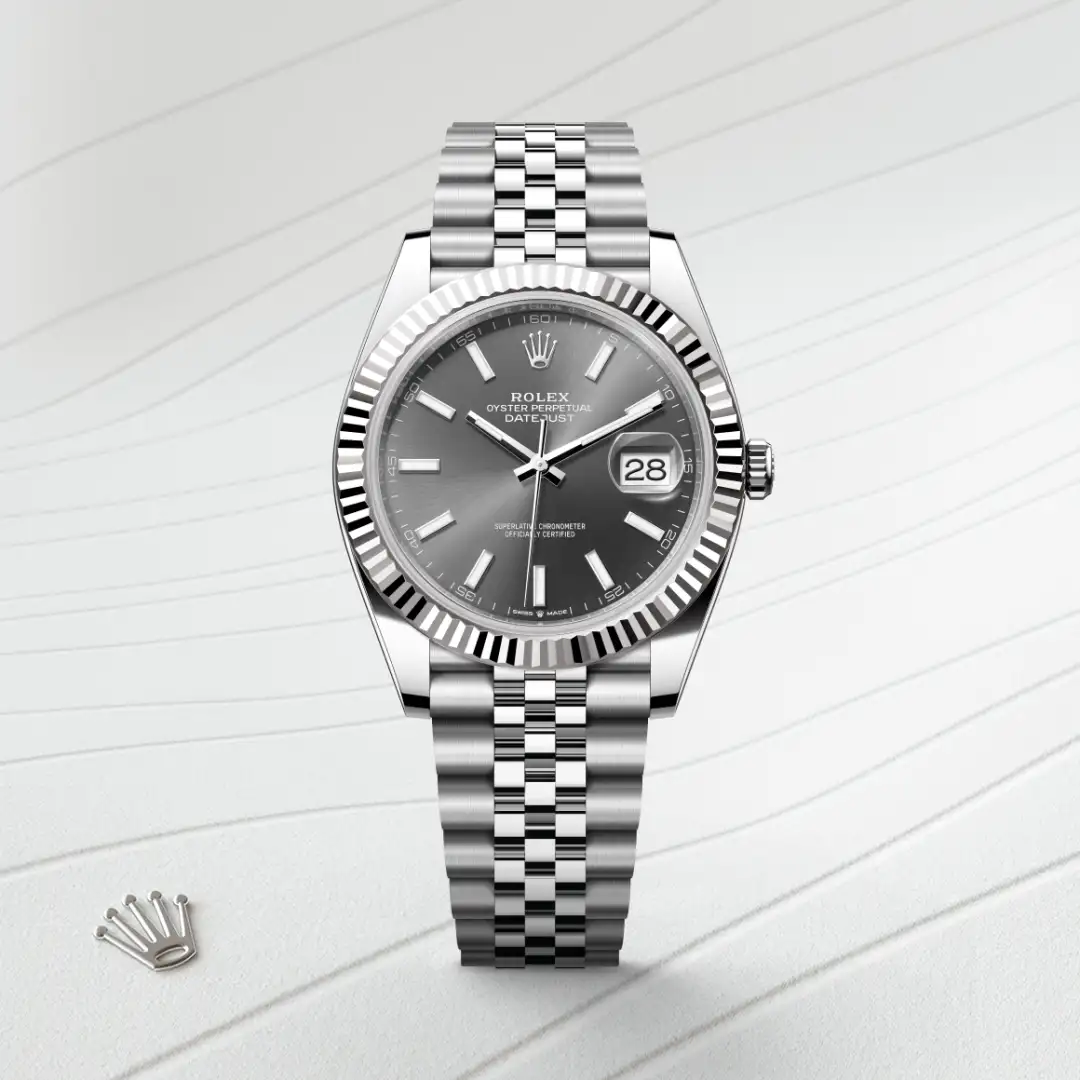 m126334-0014-slide1 | Brela Rolex Datejust stainless steel watch with grey dial, fluted bezel, Jubilee bracelet and date display at 3 o'clock. | Brela