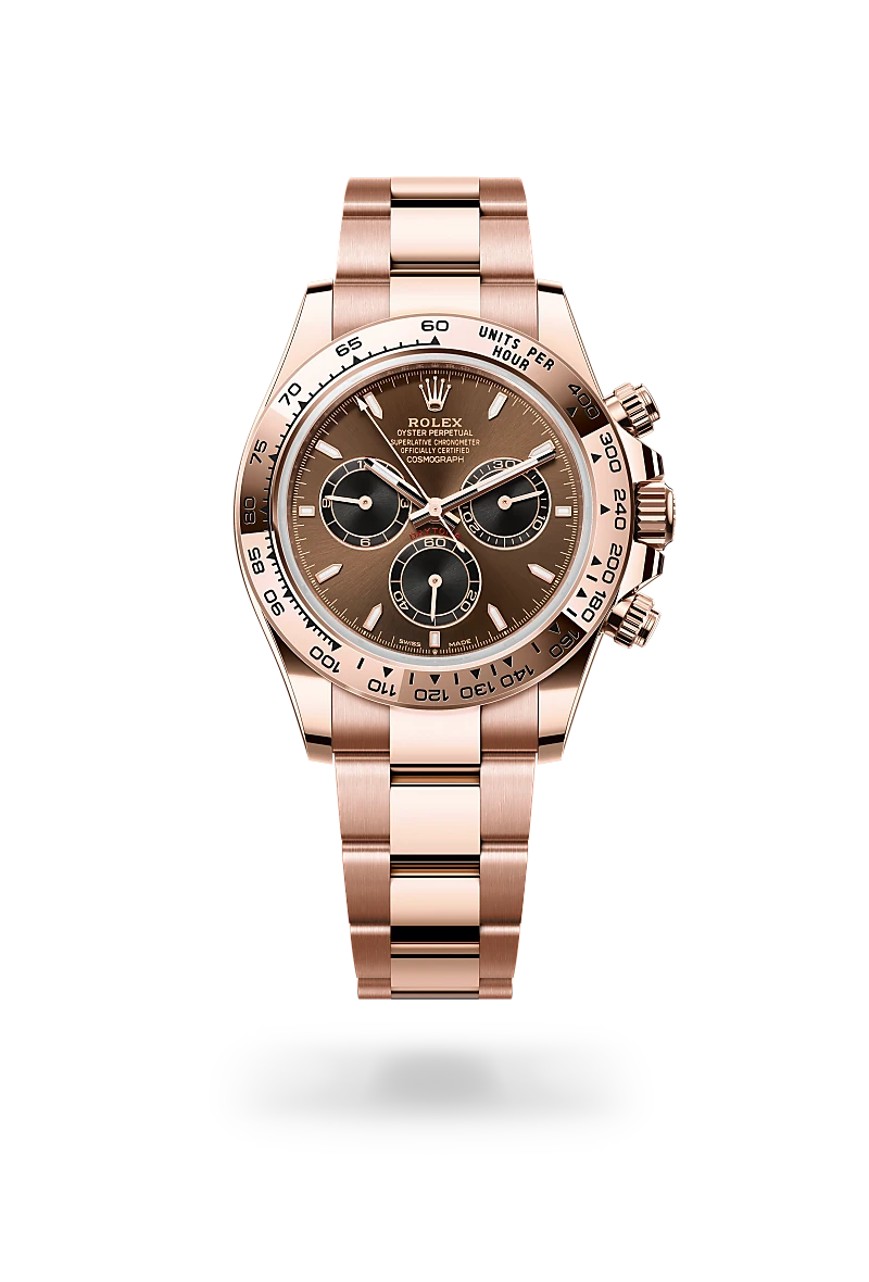 Rose gold Rolex chronograph with brown dial and three subdials, stainless bracelet and tachymeter bezel. | Brela