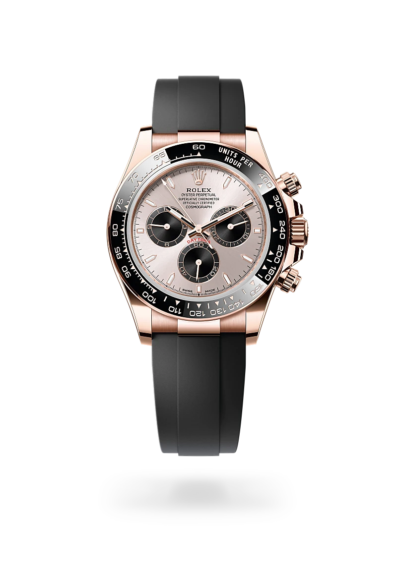 m126515ln-0006-upright-landscape | Brela Rose gold Rolex chronograph watch with black bezel and rubber strap, showing three subdials on a light dial (Daytona) | Brela