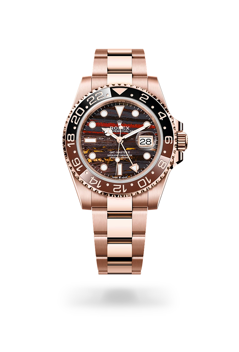 Rose gold Rolex GMT-Master II wristwatch with black dial and date window, shown against a black background | Brela