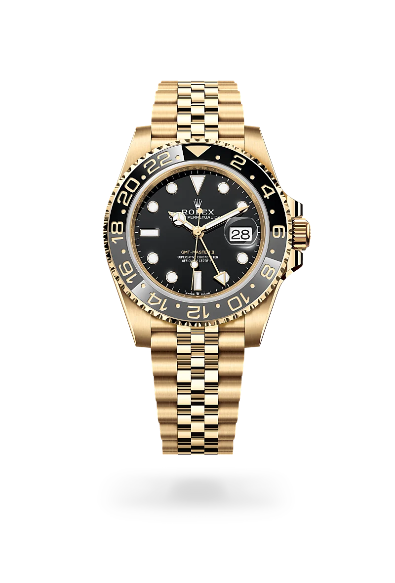 m126718grnr-0001-upright-landscape | Brela Gold Rolex GMT-Master II wristwatch with a black dial, black bezel, and date window on a gold bracelet. | Brela
