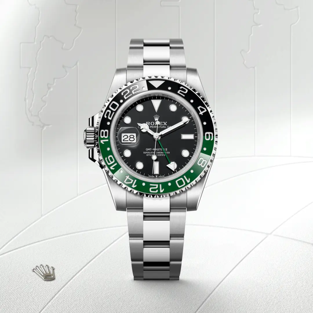 m126720vtnr-0001-slide1 | Brela Rolex GMT-Master II watch with black dial and green/black bezel, stainless steel bracelet, date window at 3 o'clock. | Brela