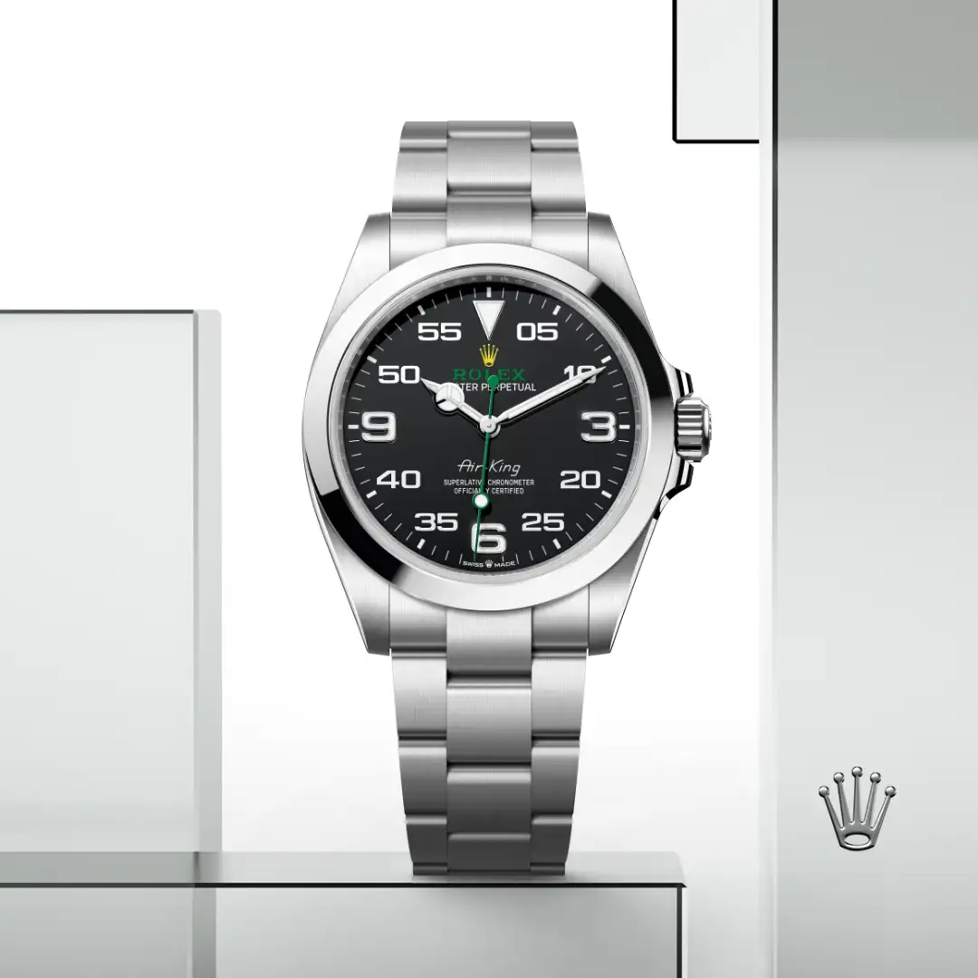 Rolex Air-King stainless steel wristwatch with black dial displayed against a white background. | Brela