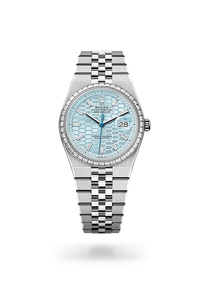 Rolex stainless steel watch with light blue patterned dial, diamond bezel, and date window at 3 o'clock on a Jubilee bracelet. | Brela