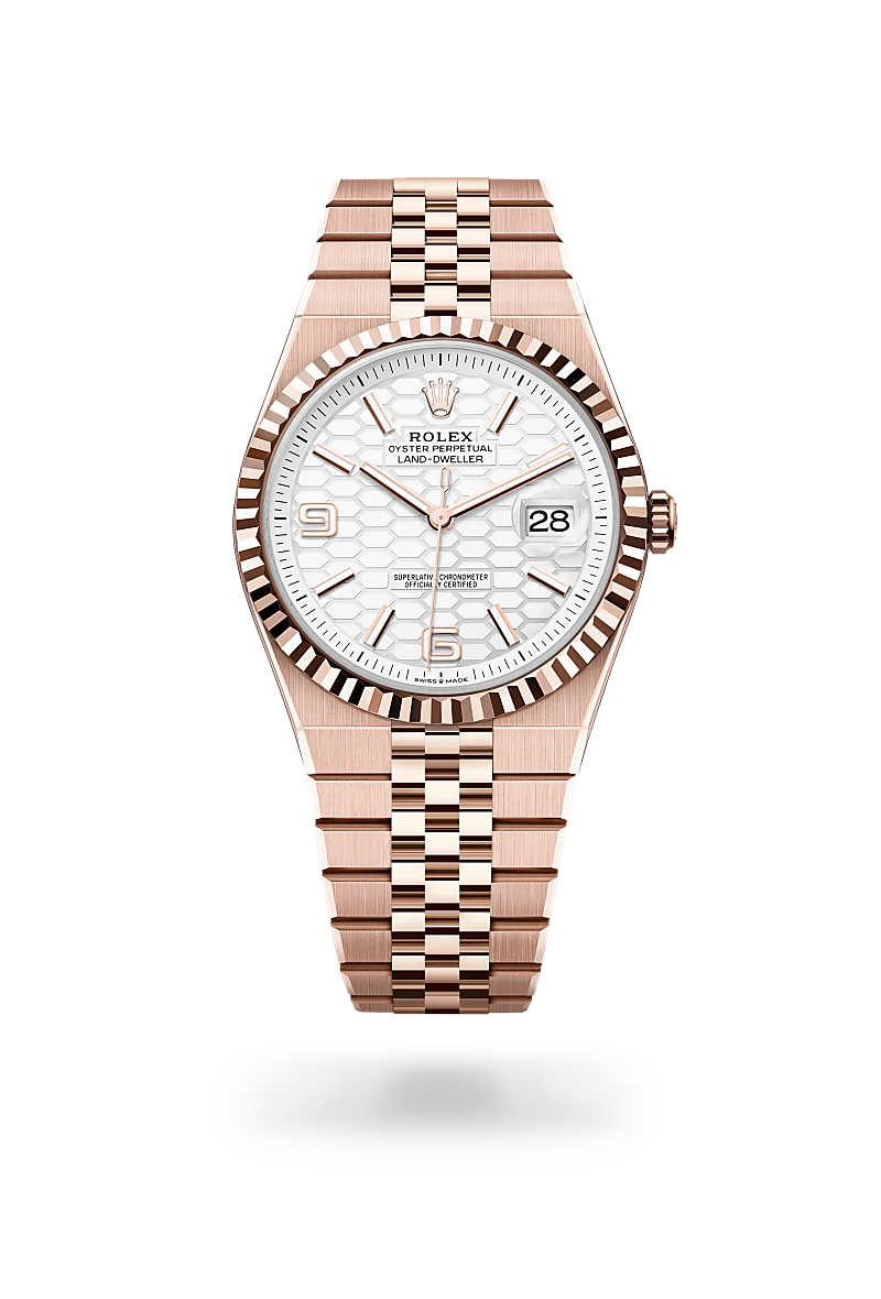 Rose gold Rolex Oyster Perpetual Land‑Dweller with white honeycomb dial, fluted bezel, and Jubilee bracelet. | Brela