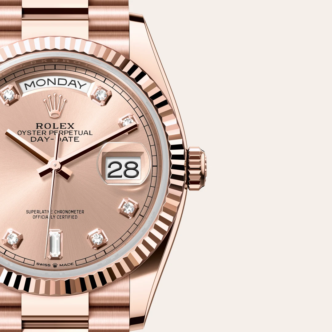 Rose gold Rolex Oyster Perpetual Day-Date watch close-up, showing date 28 and Monday display with diamond markers | Brela