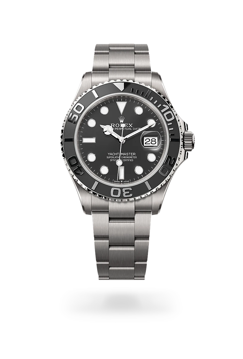 m226627-0001-upright-landscape | Brela Stainless steel Rolex Yacht-Master watch with black dial and date magnifier, shown against a black background. | Brela