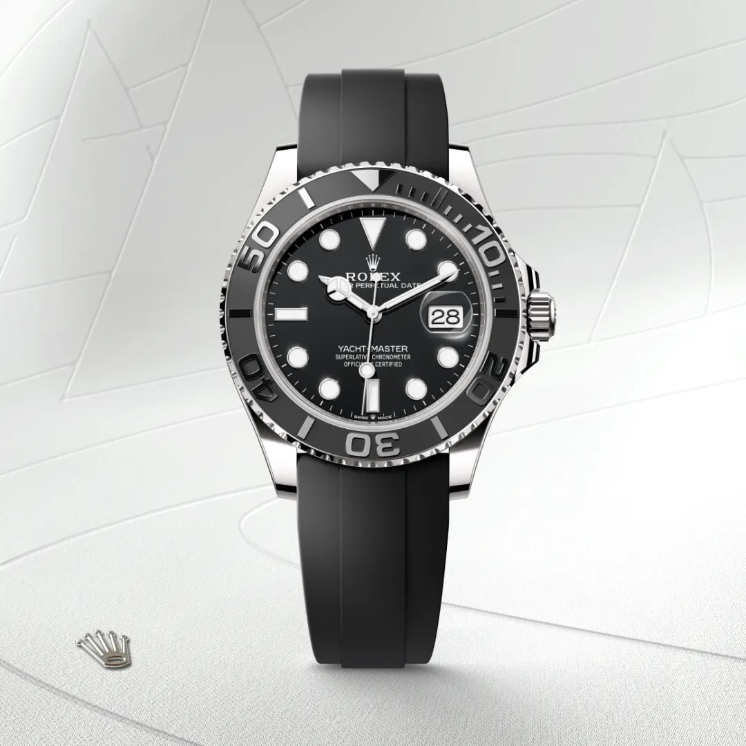 m226659-0002-slide1 | Brela Rolex Yacht-Master wristwatch with a black dial, ceramic bezel, and black rubber strap showing the date at 3 o'clock | Brela