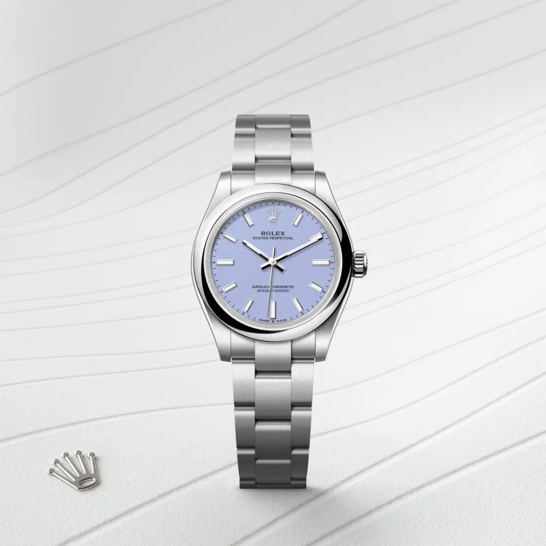 m277200-0014-slide1 | Brela Rolex Oyster Perpetual watch with a light blue dial and stainless steel bracelet on a white textured background. | Brela