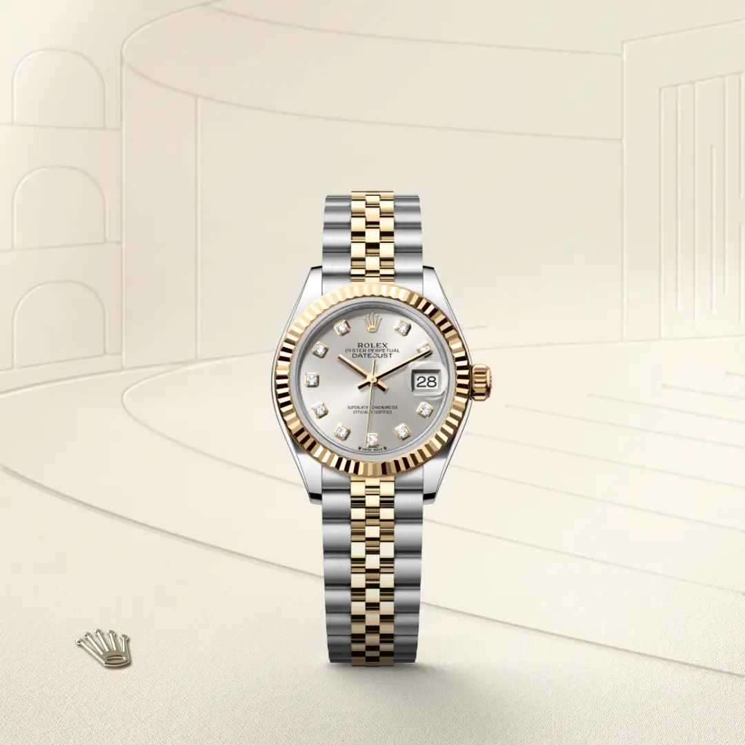 m279173-0007-slide1 | Brela Two-tone Rolex Datejust watch with diamond hour markers and a date window on a silver dial. | Brela