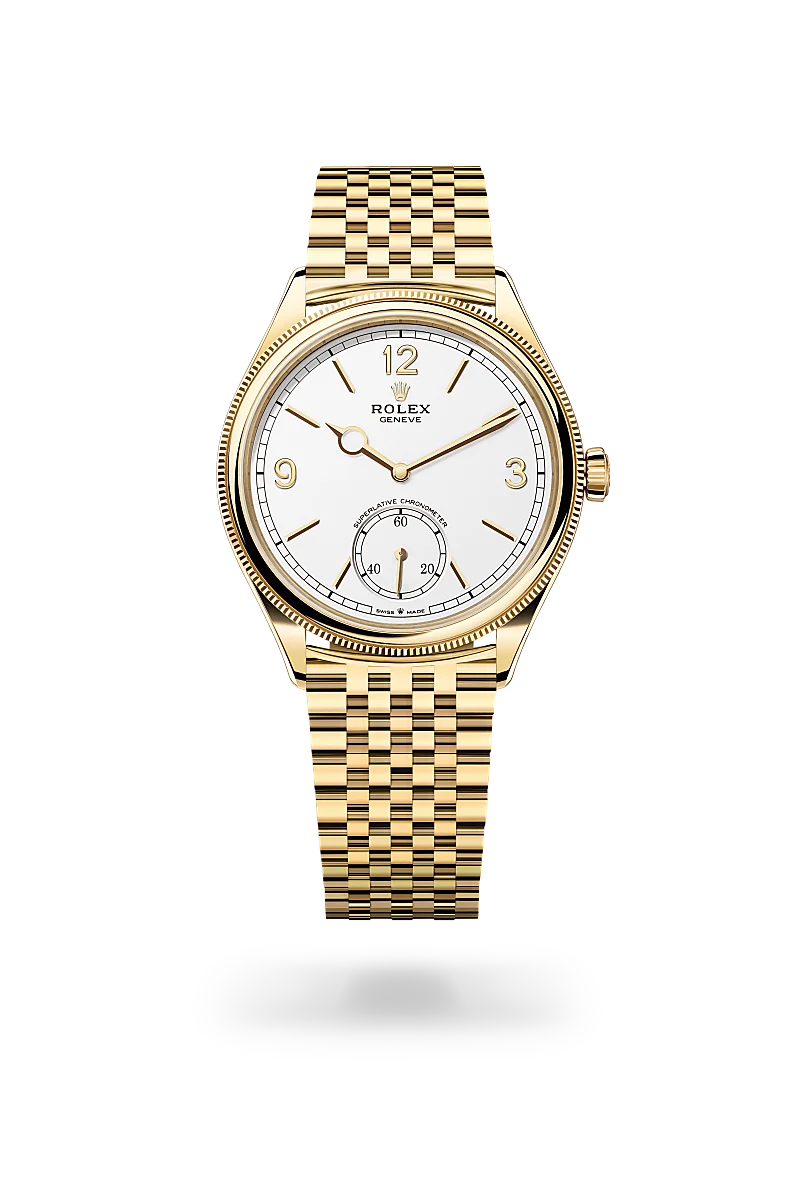 m52508-0008-upright-landscape | Brela Gold Rolex wristwatch with white dial and gold bracelet, featuring a small seconds subdial at 6 o'clock and index markers | Brela