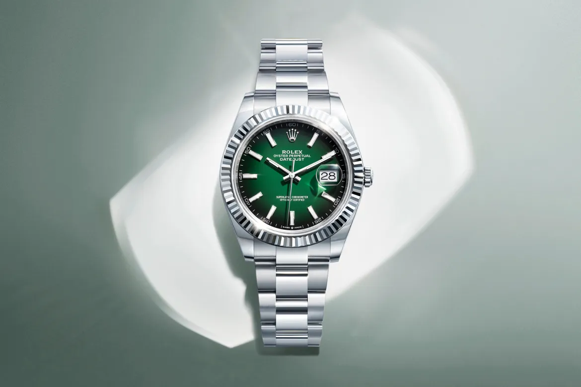 rolex-watches-datejust-m126334-0033-landscape | Brela Rolex Oyster Perpetual Datejust stainless steel watch with a green dial and date window at 3 o'clock. | Brela