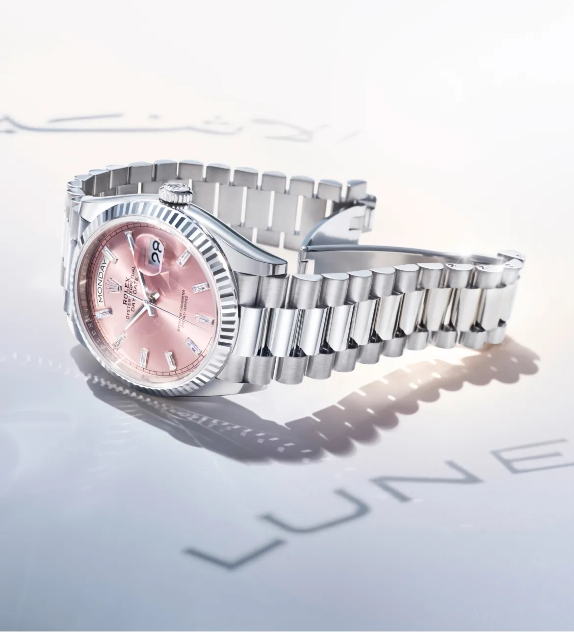 rolex-day-date-m128239-0071-portrait Rolex Datejust with a pink dial and diamond hour markers on a silver stainless steel bracelet