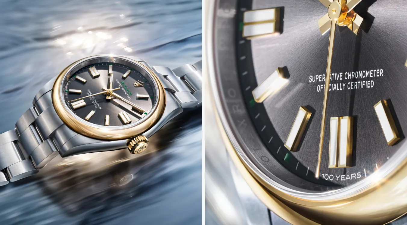 rolex-oyster-perpetual-100th-anniversary-model-m134303-0001-landscape Two-panel close-up of a Rolex watch: left shows the silver and gold bracelet and dark face by water; right shows a magnified dial with gold hour markers and 'Superlative Chronometer Officially Certified' text.