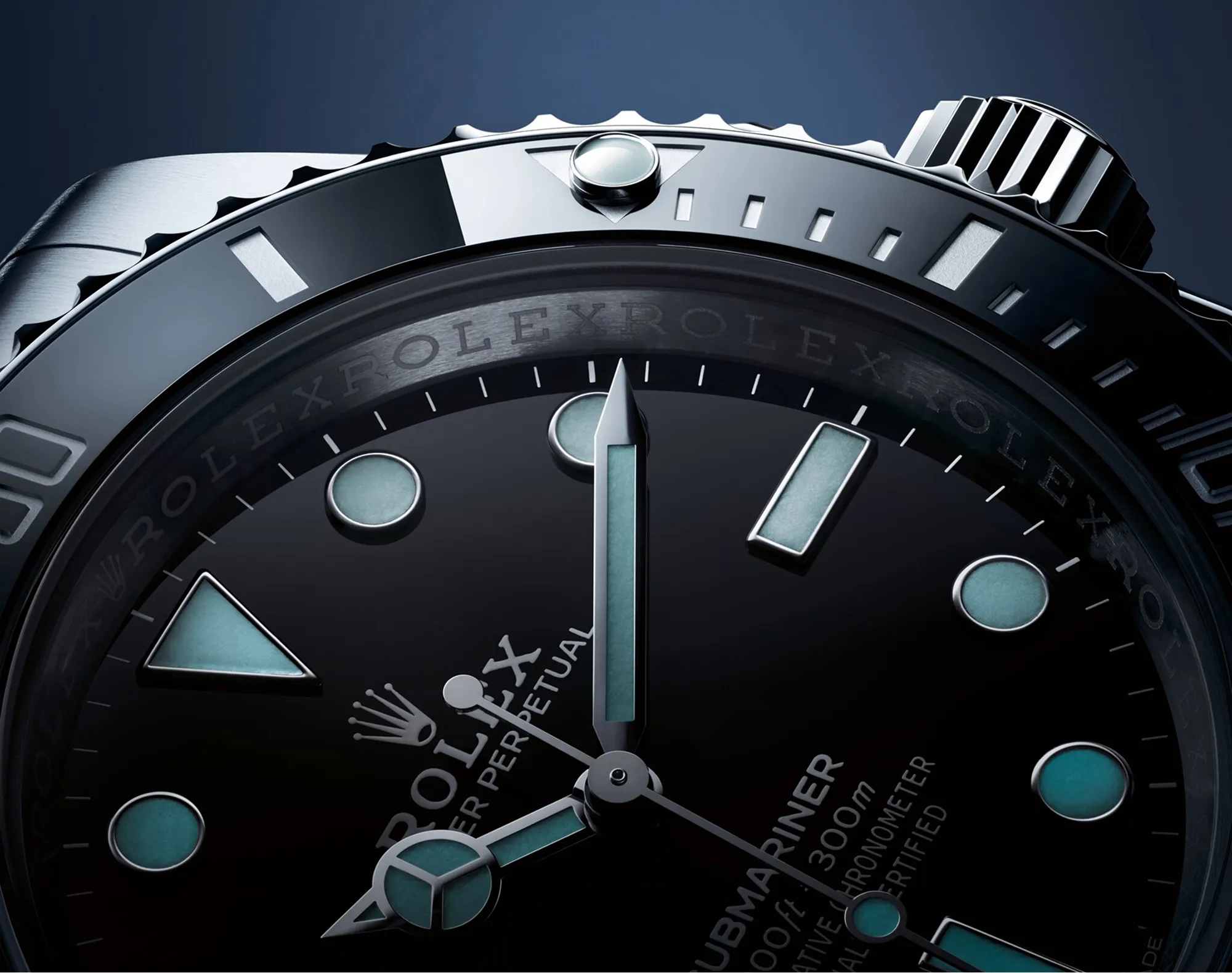 Close-up of a Rolex watch bezel and crown, highlighting the brand and polished metal detailing.