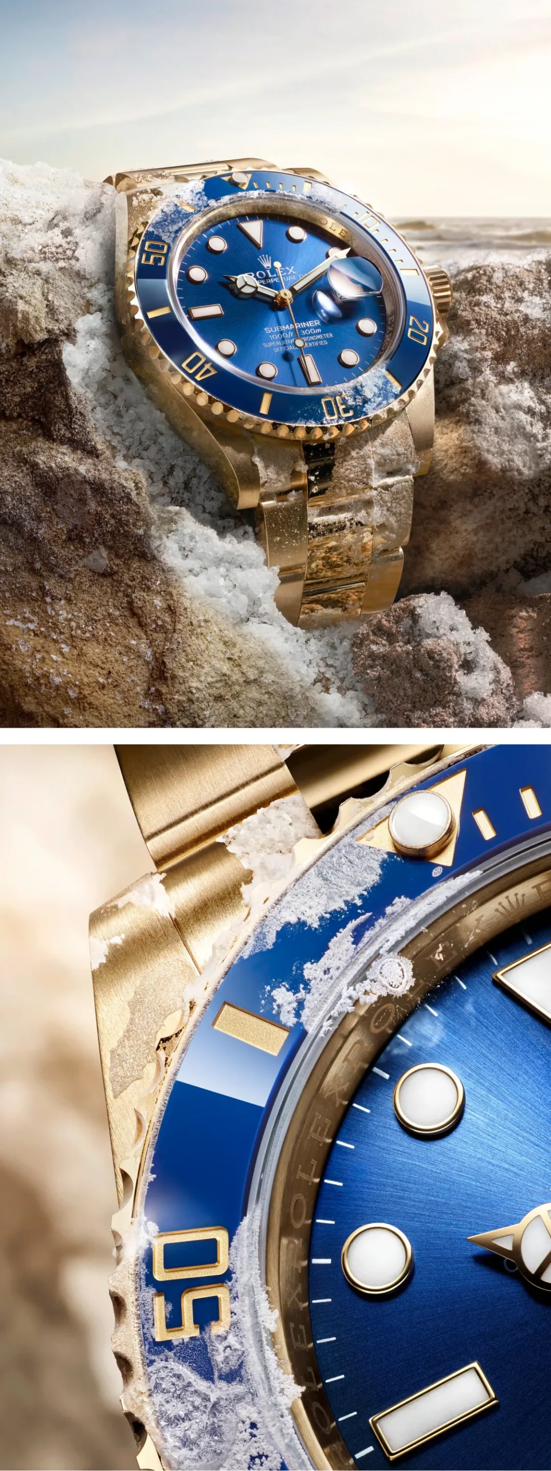 Gold Rolex Submariner with blue dial and bezel resting on snowy rocks, close-up view of the watch’s face and bracelet