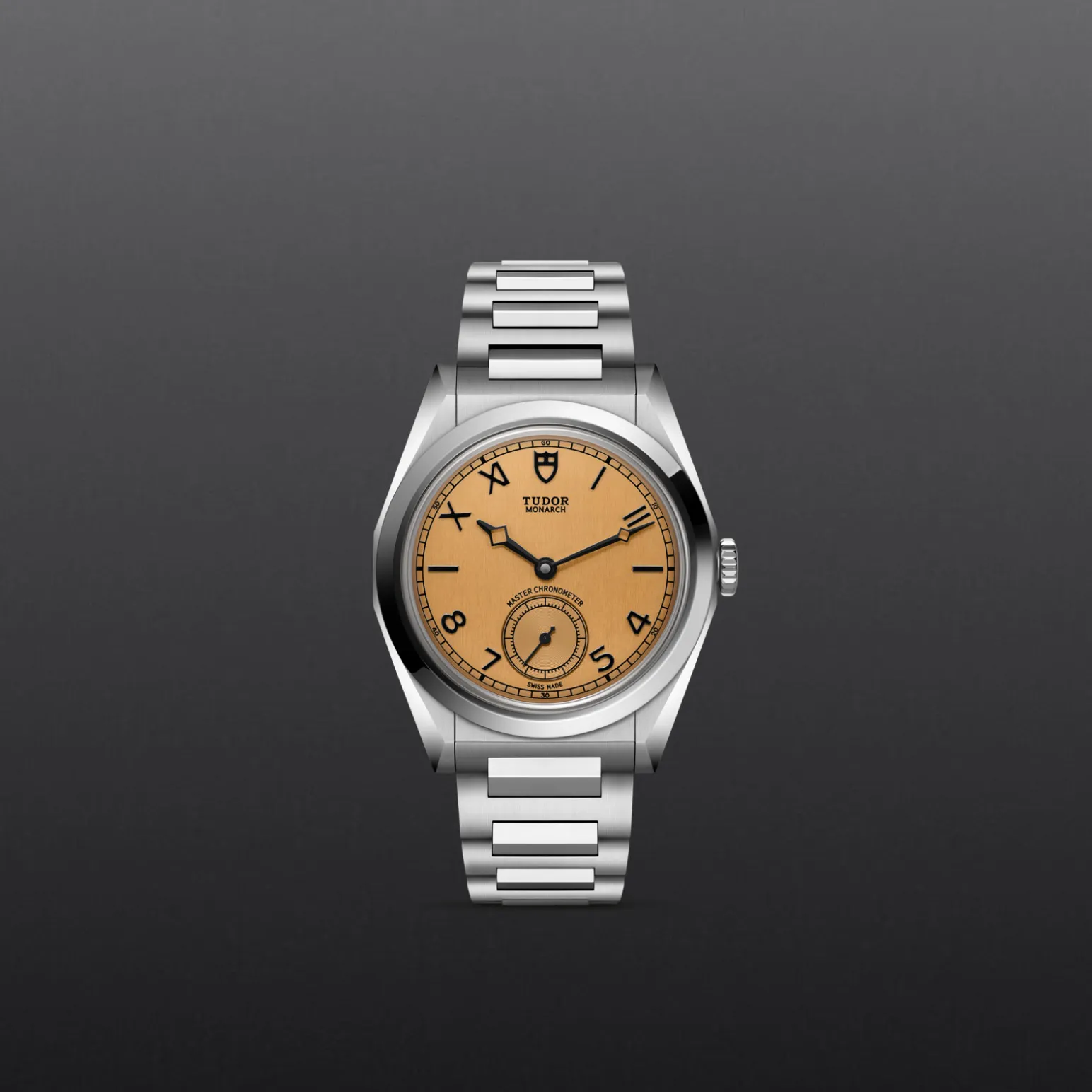 m2639w1a0u-0001-upright_watch_grey_background-model_page_only_standard_size | Brela Silver Tudor Monarch wristwatch with an orange dial on a dark gray background, centered and facing forward. | Brela