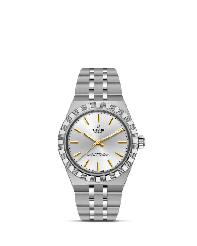m2830a1a0-0002_upright-wh-std-grid | Brela | Brela Stainless steel Tudor wristwatch with a fluted bezel, silver dial, and gold-tone hands and markers on a polished bracelet | Brela | Brela