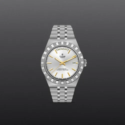 Silver Tudor wristwatch with gold hour markers and a day-date display against a dark gradient background