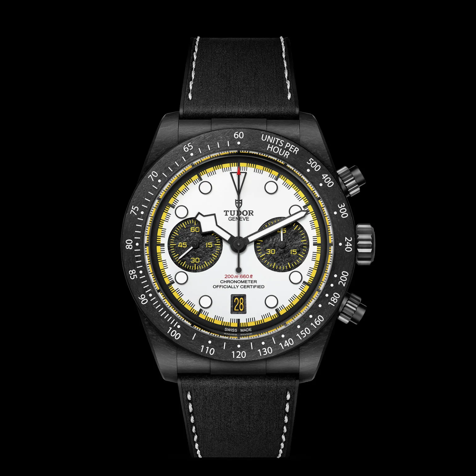 m79377kn-0003-upright_watch_black_background_zoomed_in | Brela Close-up of a Tudor chronograph watch with a white dial, black bezel, yellow accents, and black leather strap on a black background. | Brela