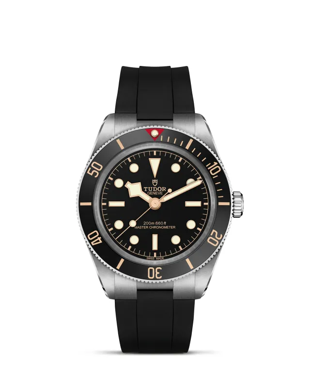 m7939a1a0nu-0003_upright-wh-std-grid | Brela | Brela Tudor diver's watch with black dial, luminous indices, and a black rubber strap. | Brela | Brela