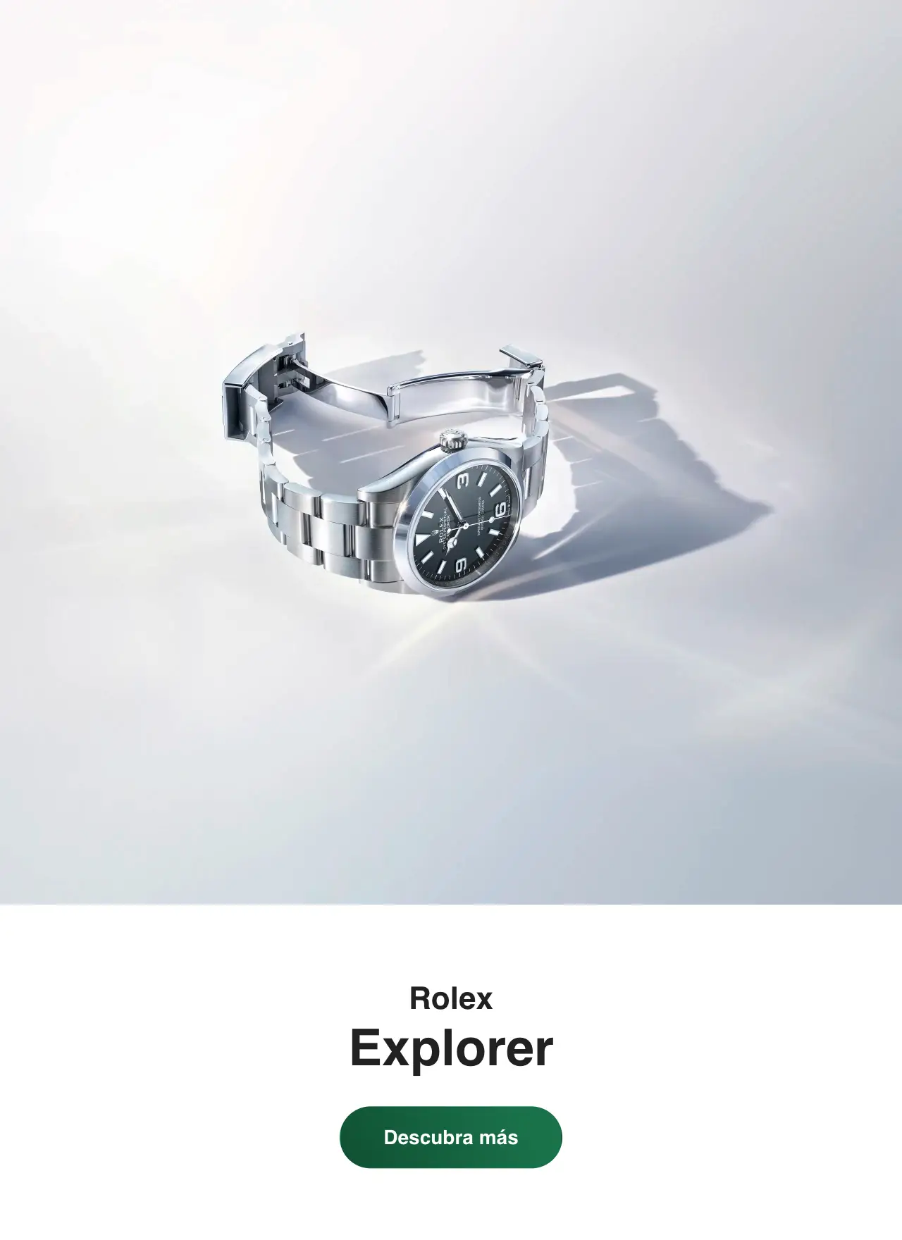Silver Rolex Explorer wristwatch with black dial resting on a reflective light surface | Brela
